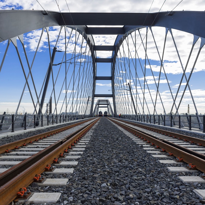 Fixed bridge for rail transport